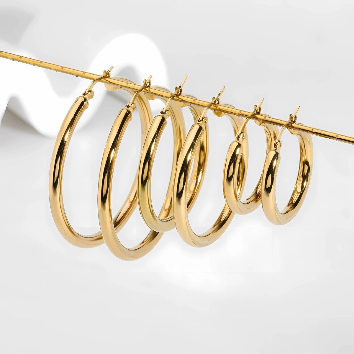 Classic hoop earrings in gold or silver finish – ACSRY product image 6
