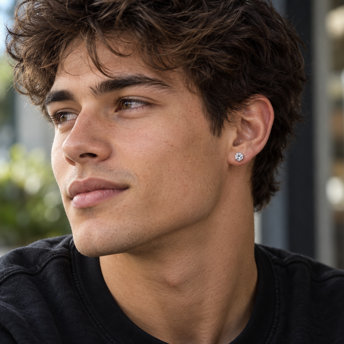 Man wearing a silver stud earring